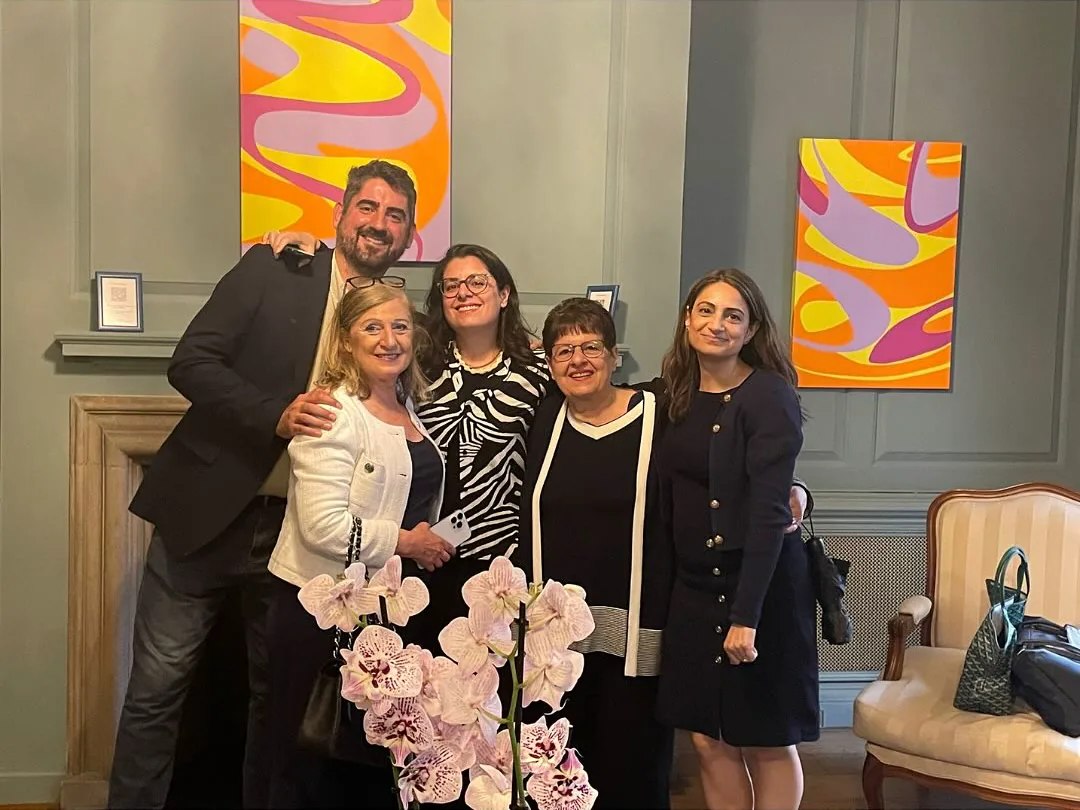 Guests with Kika Pierides artwork at the exhibition opening