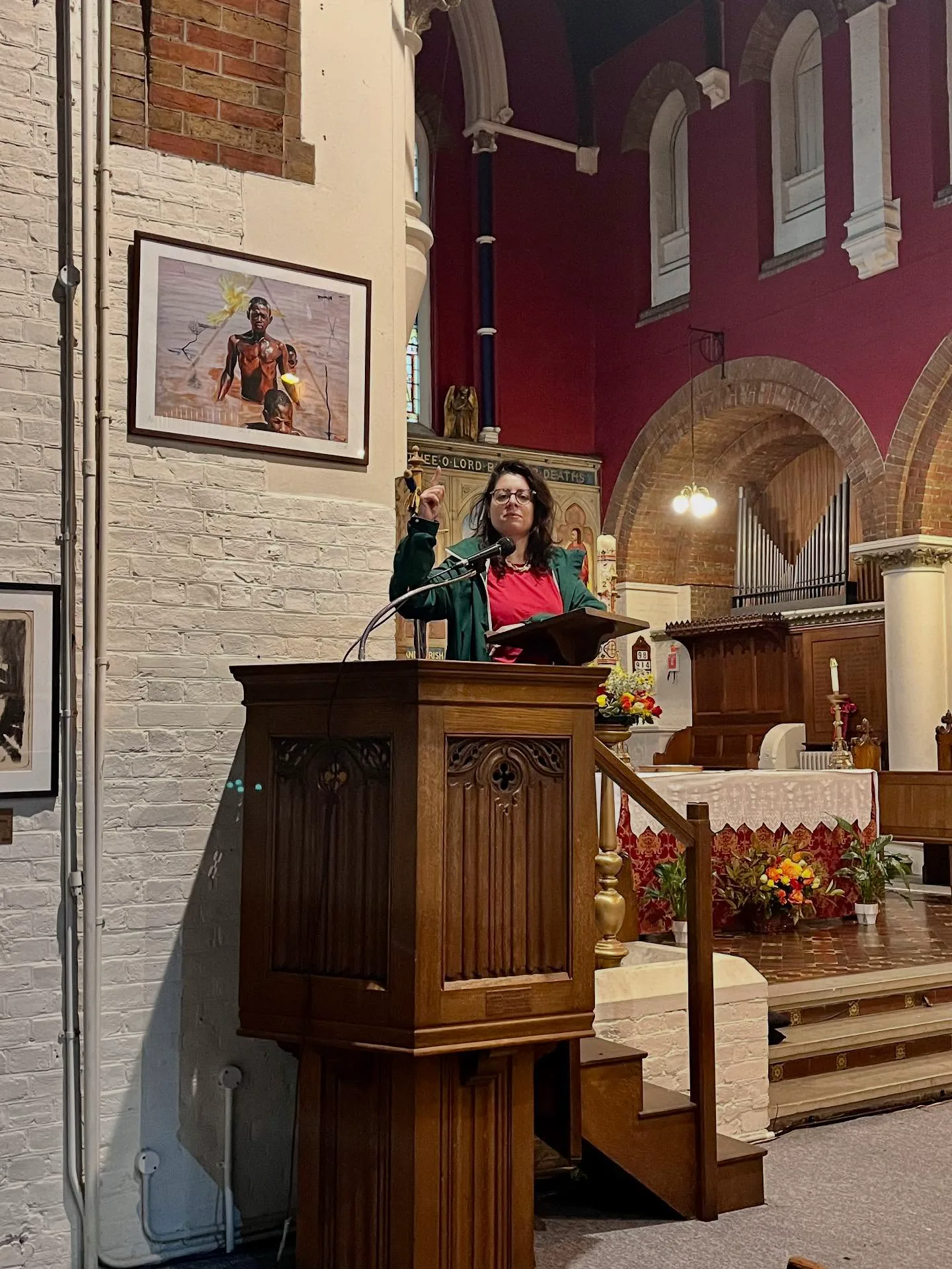 Kika Pierides speaking at the Holy Innocents Church venue