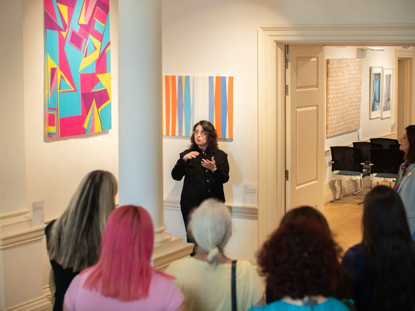 Kika Pierides speaking during the There Is An Island III exhibition