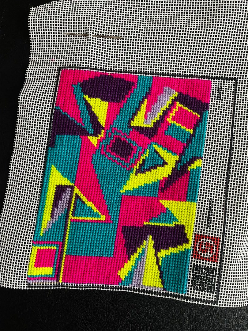 Geometric needlepoint art.