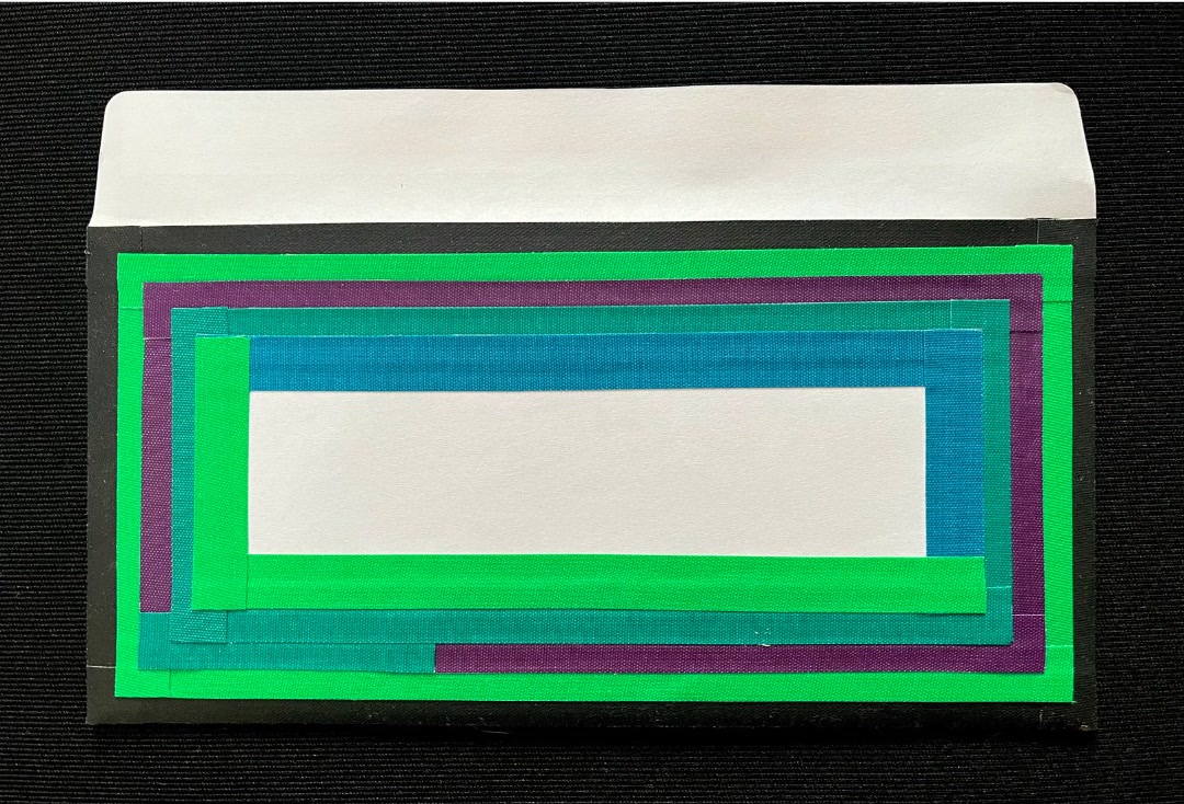 Taped collage on envelope.