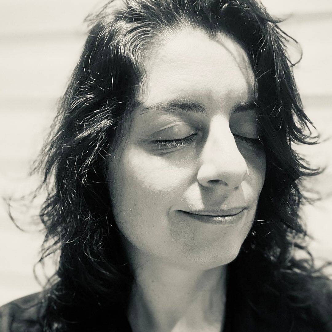Woman eyes closed portrait.