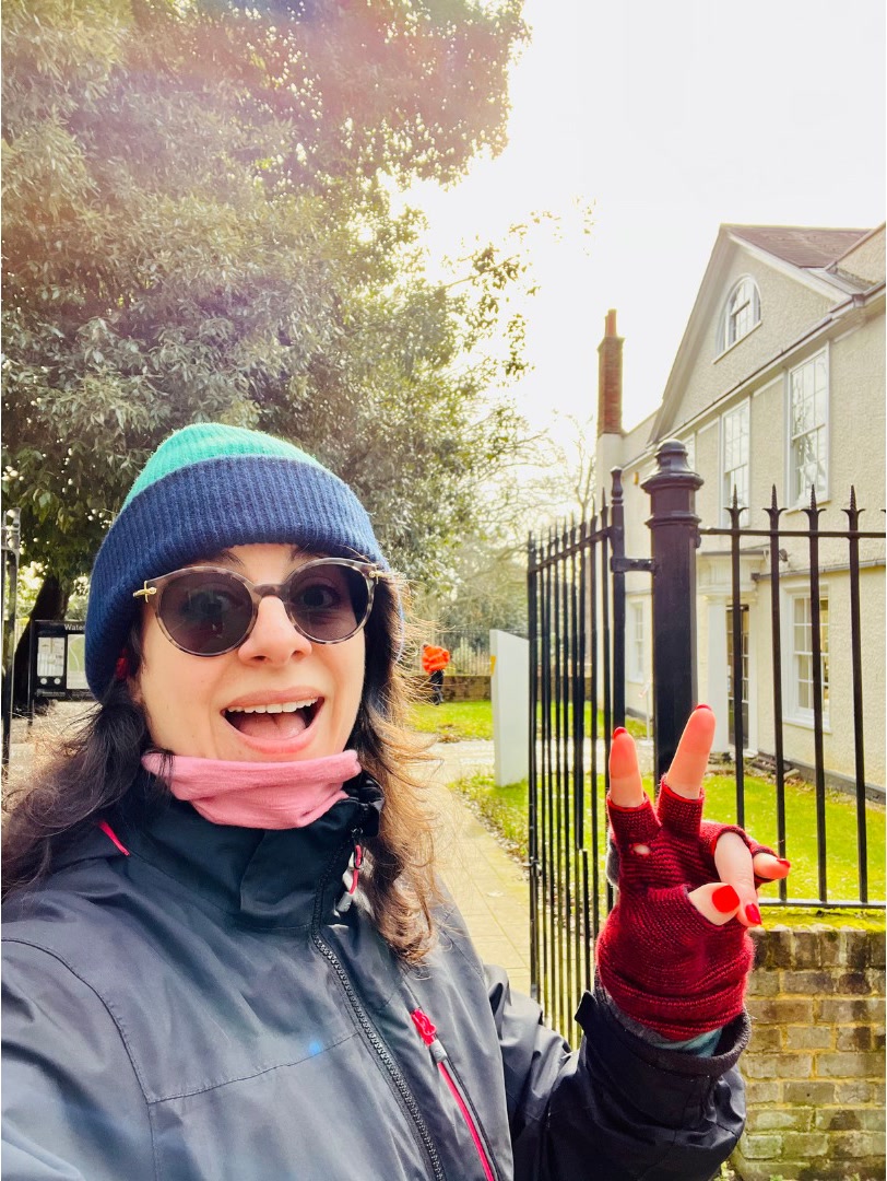 Woman peace sign selfie.