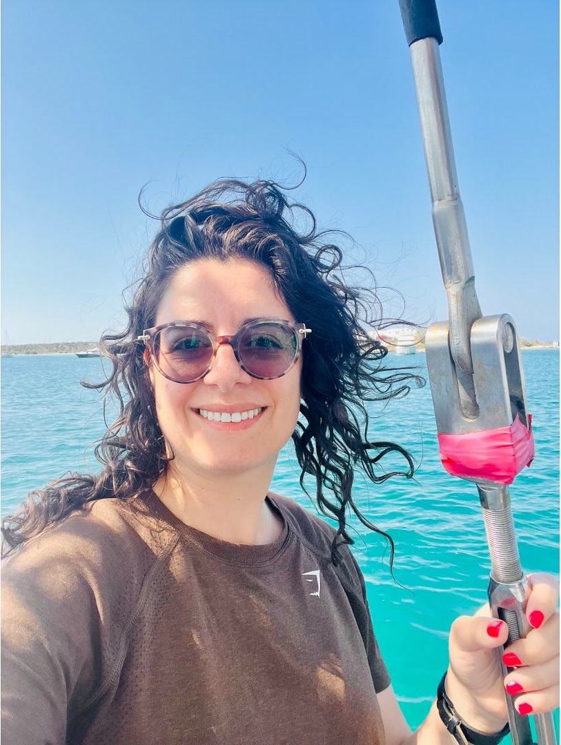 Woman sailing boat trip.
