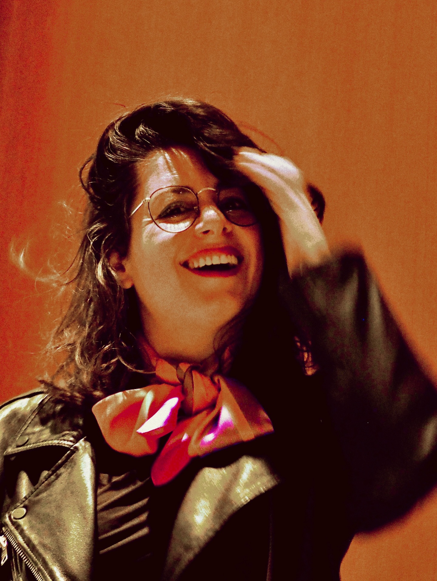 Woman with pink scarf.